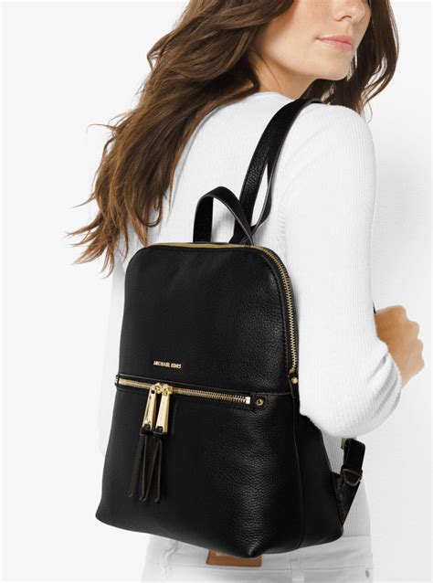 michael kors rhea slim leather backpack|michael michael kors rhea zip medium slim backpack .